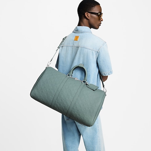 Túi Keepall Bandoulière 50 Taurillon Monogram in Túi và Phụ kiện bằng da's Túi xách nam Mới nhất collections by Louis Vuitton (Thu phóng sản phẩm)