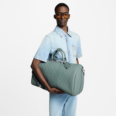 Túi Keepall Bandoulière 50 Taurillon Monogram in Túi và Phụ kiện bằng da's Túi xách nam Mới nhất collections by Louis Vuitton (Thu phóng sản phẩm)