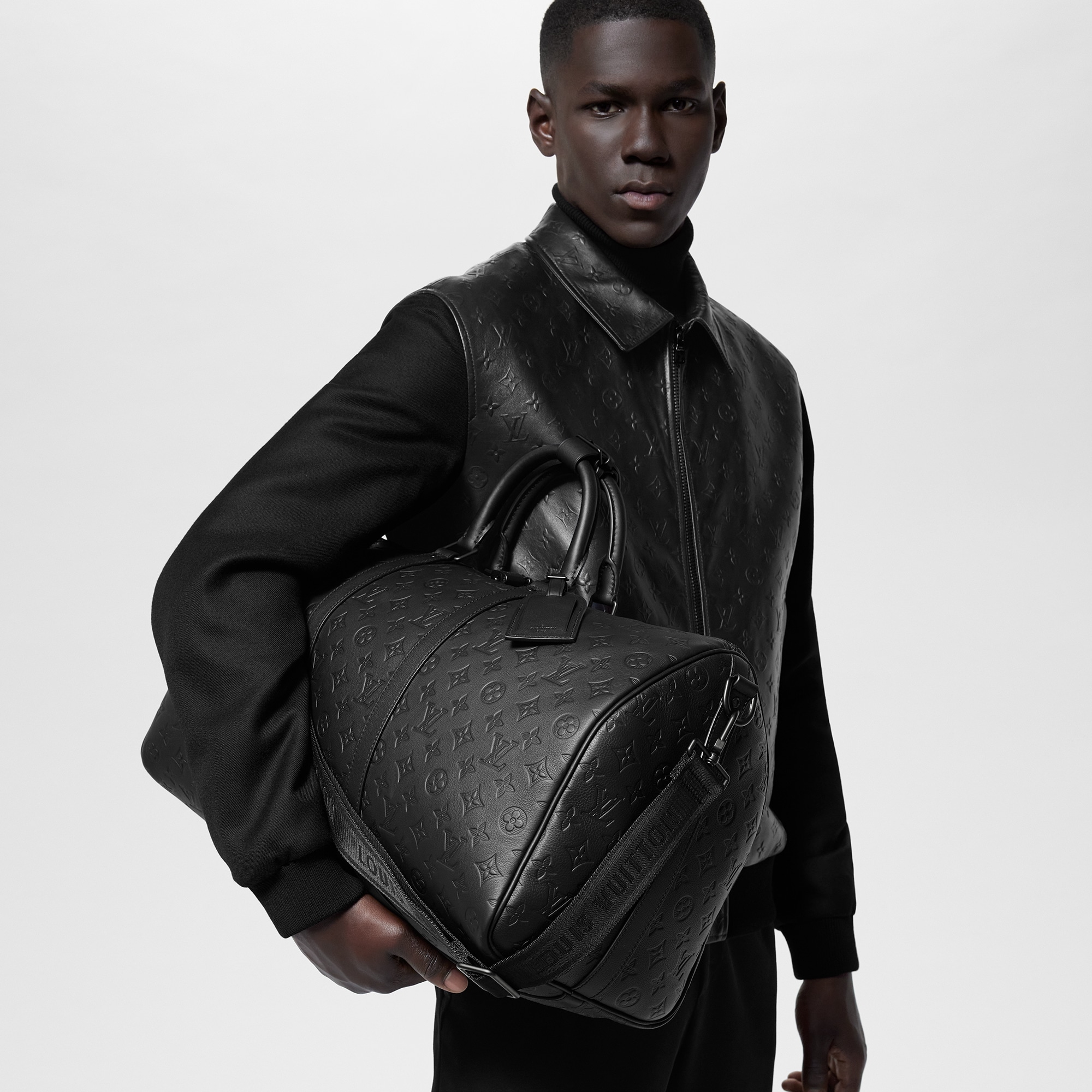 Túi Keepall Bandoulière 50 Monogram Shadow Leather in Đồ Nam